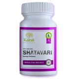 Shatavari capsules — bottle on a green background