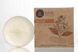 Sandal Soap — soap bar beside carton